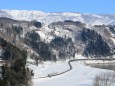 雪晴れの飯山線を行くキハ110系