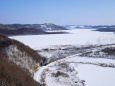 雪の釧路湿原を走るSL